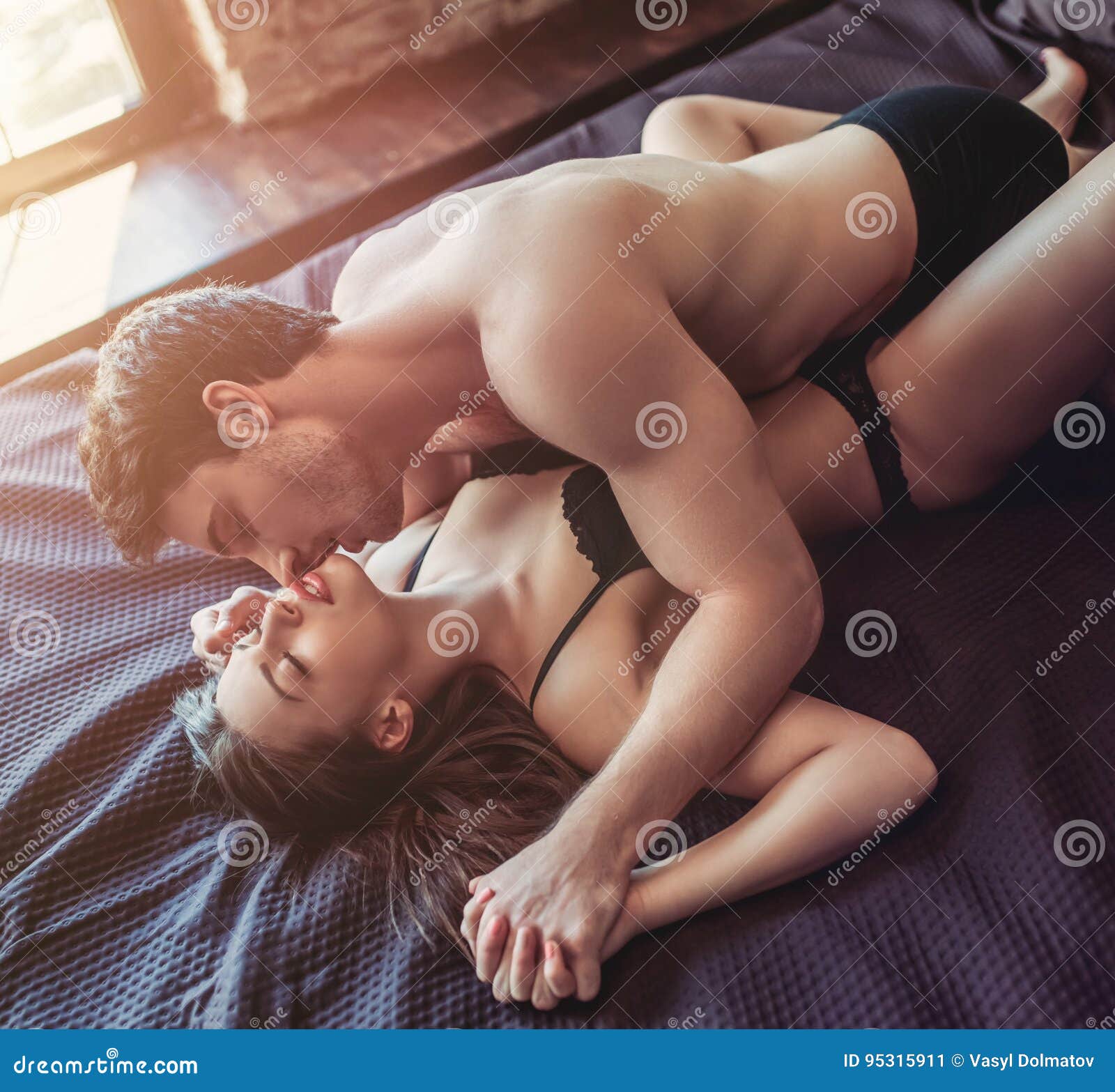stock photo couple having sex bed